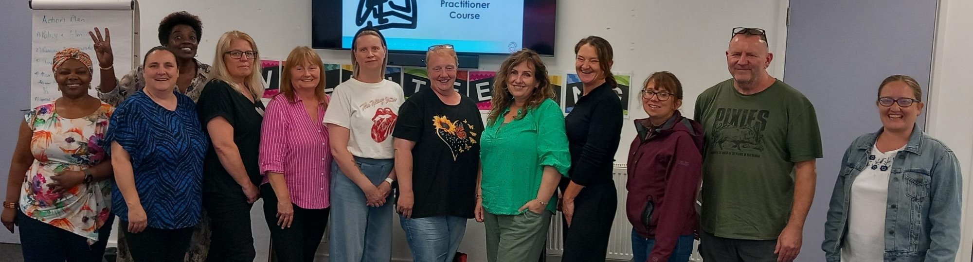 Picture of the staff members who attended the training, all smiling